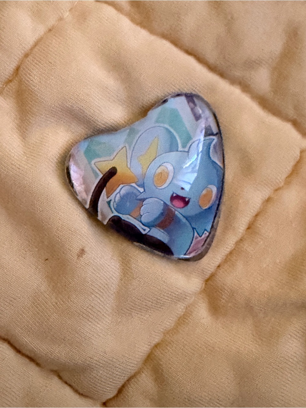 Pokemon Heart Pin with Light Blue Character and Yellow Star Accents